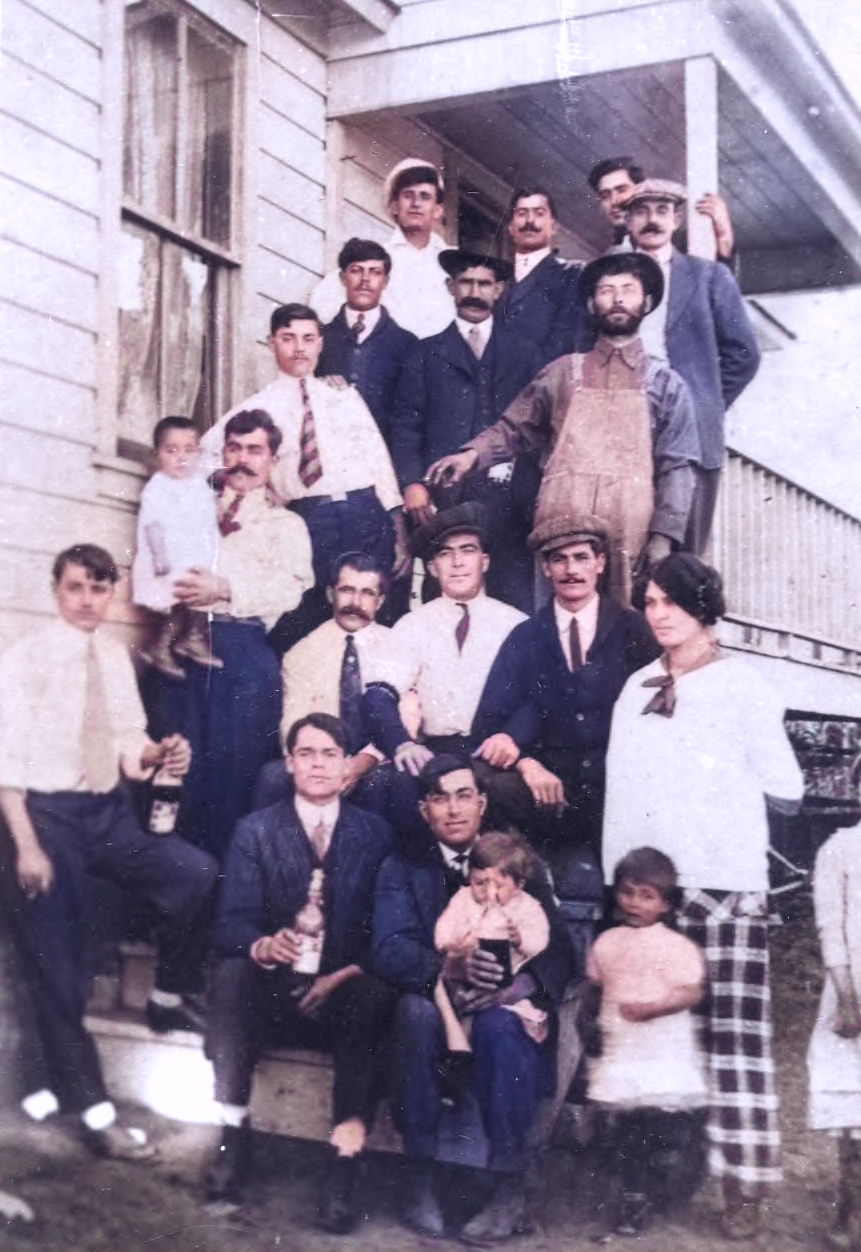 Greeks standing in front of a boarding house in Utah